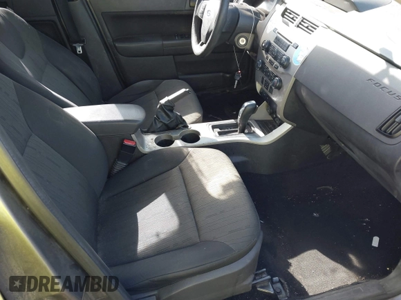 2009 Ford Focus SE z VIN 1FAHP35N79W166875, wystawiony jako IAAI lot #41506700 z przebiegiem 174 061 mil mil oraz . Historia ofert i sprzedaży dostępna na DreamBid. Obrazek 5.