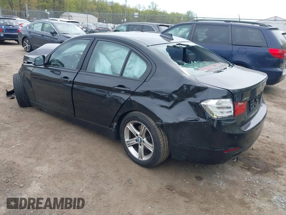2014 BMW 3 Series 320i xDrive with VIN WBA3C3C59EF984070, listed as a IAAI auction lot 42063569 with 169,002 mi miles and . Bid and sale history available at DreamBid. Image 3.