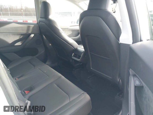 2025 Tesla Model Y Long Range with VIN 7SAYGDEE1SA343429, listed as a IAAI auction lot 41504455 with 1,284 mi miles and . Bid and sale history available at carsss.com. Image 8.