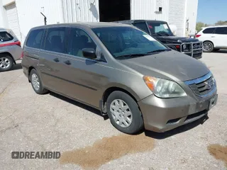 2009 Honda Odyssey LX z VIN 5FNRL382X9B019613, wystawiony jako IAAI lot #41870375 z przebiegiem 213 304 mil mil oraz . Historia ofert i sprzedaży dostępna na DreamBid. Obrazek 1.