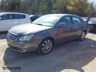 2005 Toyota Avalon XL with VIN 4T1BK36B65U027633, listed as a IAAI auction lot 41769335 with 89,904 mi miles. Bid and sale history available at carsss.com. Image 2.