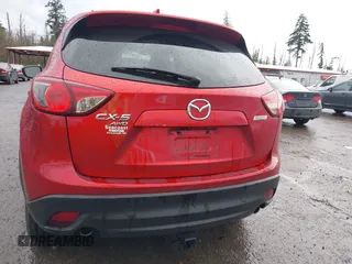 2015 Mazda CX-5 Grand Touring with VIN JM3KE4DY0F0479392, listed as a IAAI auction lot 41659415 with 141,403 mi miles. Bid and sale history available at carsss.com. Image 16.