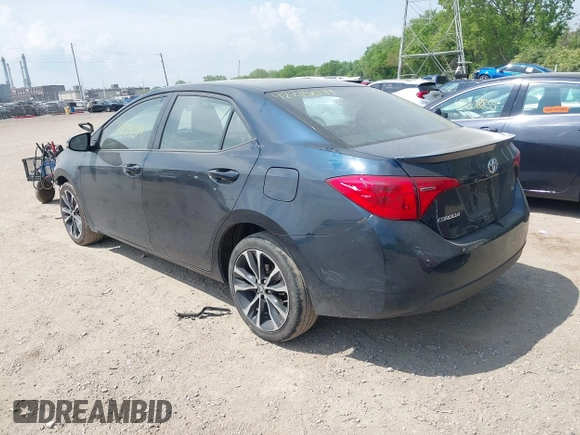 2018 Toyota Corolla L with VIN 2T1BURHE1JC111066, listed as a IAAI auction lot 42215074 with 106,677 mi miles and . Bid and sale history available at DreamBid. Image 3.