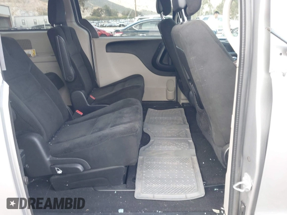 2016 Dodge Grand Caravan SXT with VIN 2C4RDGCG9GR180396, listed as a IAAI auction lot 41921312 with 130,256 mi miles and . Bid and sale history available at DreamBid. Image 8.