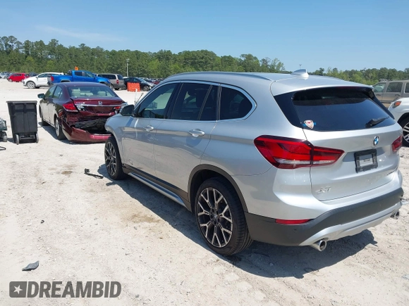 2021 BMW X1 sDrive28i with VIN WBXJG7C06M5T14235, listed as a IAAI auction lot 42021762 with 53,384 mi miles and . Bid and sale history available at DreamBid. Image 3.