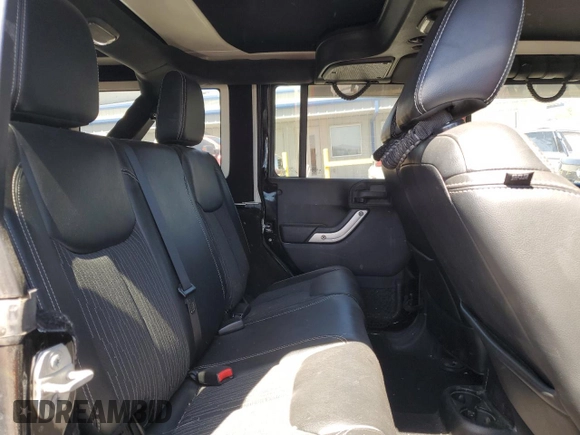 2015 Jeep Wrangler Unlimited Freedom with VIN 1C4HJWDG0FL598947, listed as a Copart auction lot 61794214 with 125,778 mi miles and Salvage title. Bid and sale history available at DreamBid. Image 12.