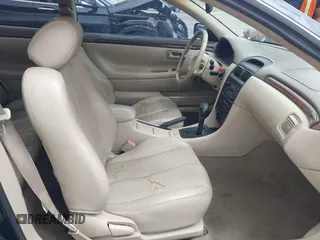 1999 Toyota Solara SE with VIN 2T1CF22P7XC150690, listed as a IAAI auction lot 42051493 with 251,411 mi miles. Bid and sale history available at carsss.com. Image 5.