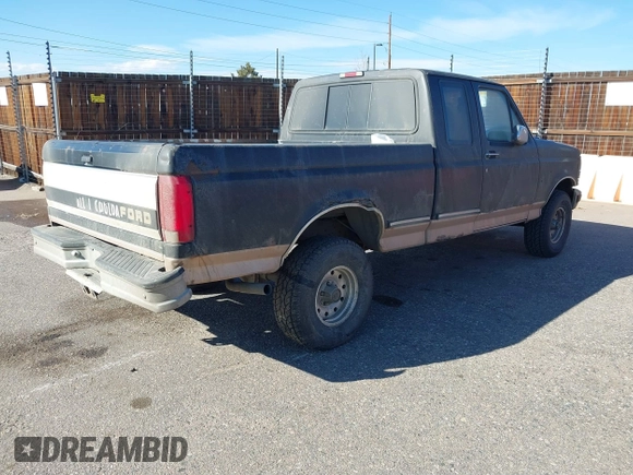 1996 Ford F-150 with VIN 1FTEX14N0TKA41914, listed as a IAAI auction lot 41724340 with 158,652 mi miles. Bid and sale history available at carsss.com. Image 4.