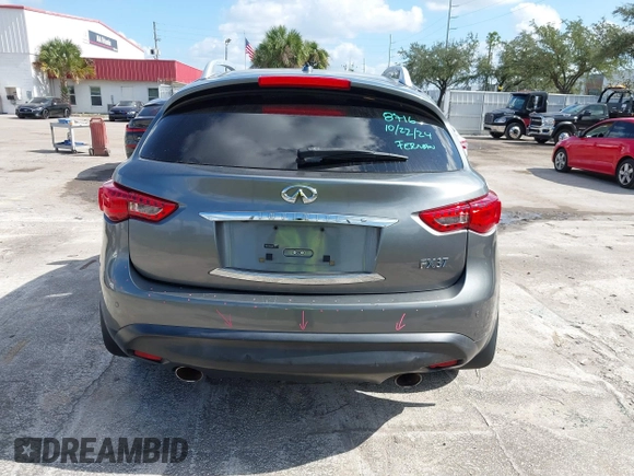 2013 Infiniti FX with VIN JN8CS1MU0DM140711, listed as a IAAI auction lot 40796518 with 179,386 mi miles and . Bid and sale history available at DreamBid. Image 17.