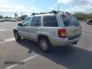 2004 Jeep Grand Cherokee Limited with VIN 1J4GW58N54C299669, listed as a IAAI auction lot 42369745 with 90,240 mi miles and . Bid and sale history available at DreamBid. Image 3.