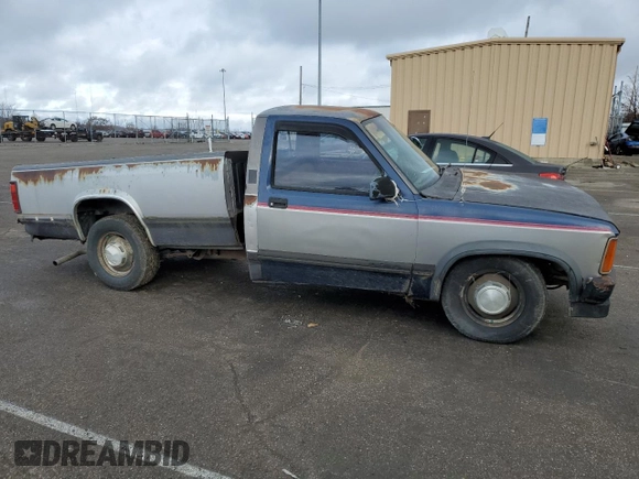 1989 Dodge Dakota S z VIN 1B7GL26X9KS129335, wystawiony jako Copart lot #82744003 z przebiegiem 174 152 mil mil oraz Szkoda całkowita • Salvage title. Historia ofert i sprzedaży dostępna na DreamBid. Obrazek 4.