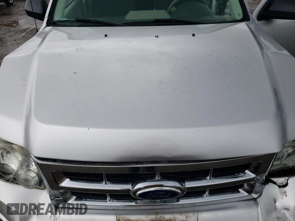 2010 Ford Escape XLS with VIN 1FMCU9C78AKD21851, listed as a Copart auction lot 61444945 with 70,404 mi miles and Clean title. Bid and sale history available at DreamBid. Image 12.