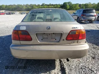 2000 Honda Civic EX z VIN 1HGEJ8644YL006620, wystawiony jako Copart lot #53127955 z przebiegiem 218 099 mil mil oraz Szkoda całkowita • Salvage title. Historia ofert i sprzedaży dostępna na DreamBid. Obrazek 6.