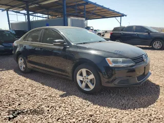 2014 Volkswagen Jetta TDI w/Premium with VIN 3VWLL7AJ8EM402757, listed as a Copart auction lot 52201895 with 99,475 mi miles and Salvage title. Bid and sale history available at DreamBid. Image 4.