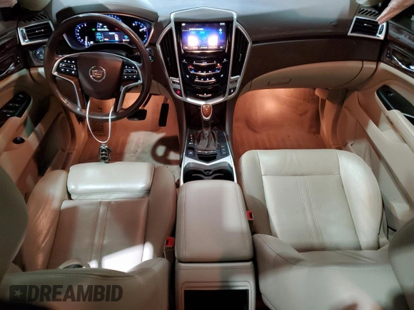 2016 Cadillac SRX Performance Collection with VIN 3GYFNCE36GS525836, listed as a Copart auction lot 84502634 with 94,639 mi miles and Salvage title. Bid and sale history available at DreamBid. Image 8.