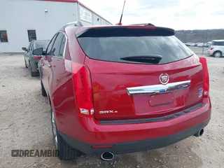 2014 Cadillac SRX Luxury Collection with VIN 3GYFNEE33ES544269, listed as a IAAI auction lot 41855086 with 182,825 mi miles. Bid and sale history available at carsss.com. Image 3.
