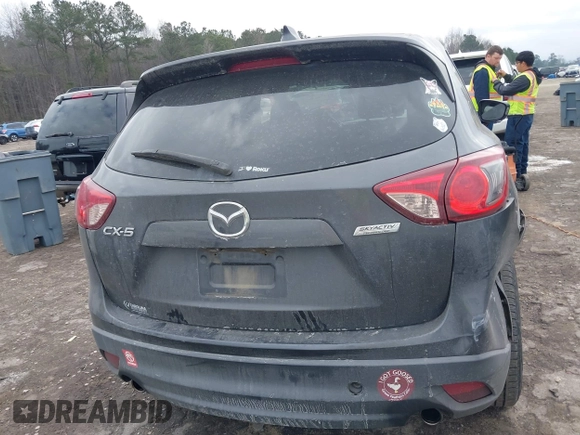 2015 Mazda CX-5 Touring with VIN JM3KE2CY2F0461935, listed as a IAAI auction lot 41430070 with 220,857 mi miles and . Bid and sale history available at DreamBid. Image 16.