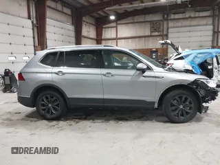 2024 Volkswagen Tiguan SE with VIN 3VVMB7AX8RM084483, listed as a IAAI auction lot 42452619 with 14,618 mi miles and . Bid and sale history available at DreamBid. Image 14.