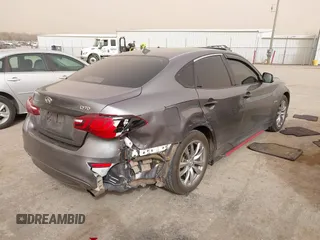 2015 Infiniti M35h Hybrid with VIN JN1EY1AP2FM510029, listed as a IAAI auction lot 41795913 with 152,475 mi miles. Bid and sale history available at carsss.com. Image 4.