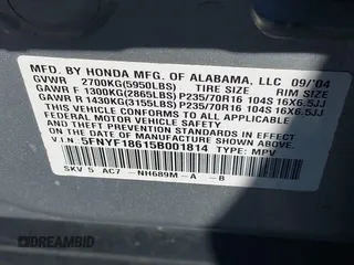 2005 Honda Pilot EX-L with VIN 5FNYF18615B001814, listed as a IAAI auction lot 42063992 with 258,923 mi miles and . Bid and sale history available at carsss.com. Image 9.