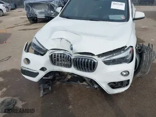 2018 BMW X1 xDrive28i with VIN WBXHT3C35J5K24695, listed as a IAAI auction lot 40932205 with 66,354 mi miles. Bid and sale history available at carsss.com. Image 6.