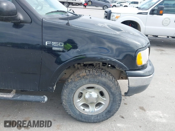 1999 Ford F-150 XL z VIN 2FTRX08L7XCA32562, wystawiony jako IAAI lot #42364671 z przebiegiem Nie podano mil oraz . Historia ofert i sprzedaży dostępna na DreamBid. Obrazek 16.