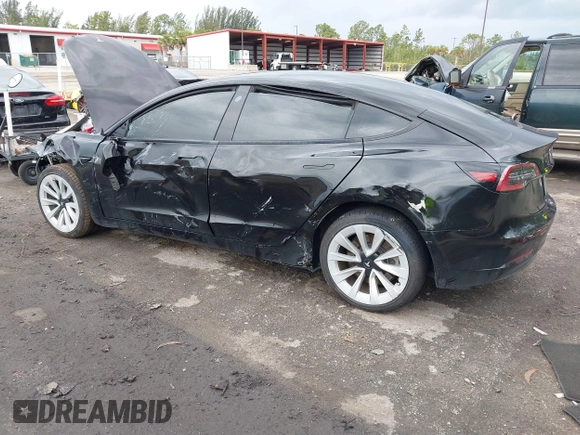 2023 Tesla Model 3 z VIN 5YJ3E1EA4PF433466, wystawiony jako IAAI lot #42249247 z przebiegiem 39 808 mil mil oraz . Historia ofert i sprzedaży dostępna na DreamBid. Obrazek 3.