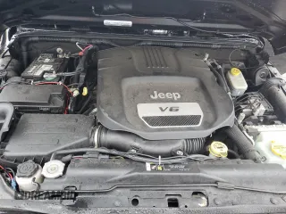 2018 Jeep Wrangler JK Unlimited Sport S with VIN 1C4BJWDG4JL850407, listed as a Copart auction lot 81468644 with 82,511 mi miles and Salvage Title. Bid and sale history available at carsss.com. Image 12.