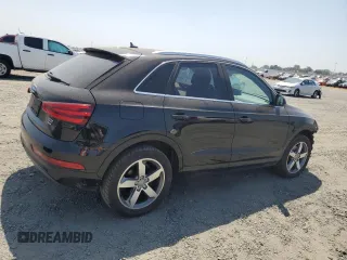 2015 Audi Q3 Premium Plus with VIN WA1EFCFS3FR013984, listed as a Copart auction lot 58785965 with 172,930 mi miles and Salvage title. Bid and sale history available at DreamBid. Image 3.