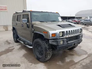 2005 Hummer H2 SUV with VIN 5GRGN23U95H132238, listed as a IAAI auction lot 41809909 with 300,293 mi miles. Bid and sale history available at carsss.com. Image 1.