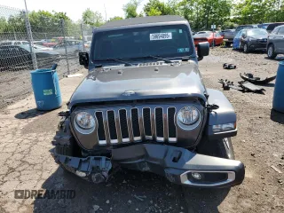 2022 Jeep Wrangler Unlimited Sahara with VIN 1C4HJXENXNW244773, listed as a Copart auction lot 59694095 with 21,871 mi miles and Salvage title. Bid and sale history available at DreamBid. Image 5.
