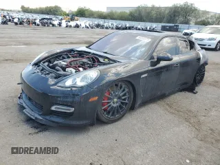 2012 Porsche Panamera Turbo z VIN WP0AC2A77CL090124, wystawiony jako Copart lot #60338974 z przebiegiem Nie podano mil oraz Szkoda całkowita • Salvage title. Historia ofert i sprzedaży dostępna na DreamBid. Obrazek 1.