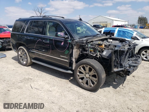 2015 GMC Yukon Denali with VIN 1GKS2CKJXFR702247, listed as a Copart auction lot 51648175 with 151,936 mi miles and Salvage Title. Bid and sale history available at carsss.com. Image 4.