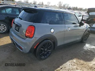 2014 MINI Hardtop S with VIN WMWXM7C57ET987816, listed as a Copart auction lot 41115434 with 122,724 mi miles and Salvage title. Bid and sale history available at DreamBid. Image 3.
