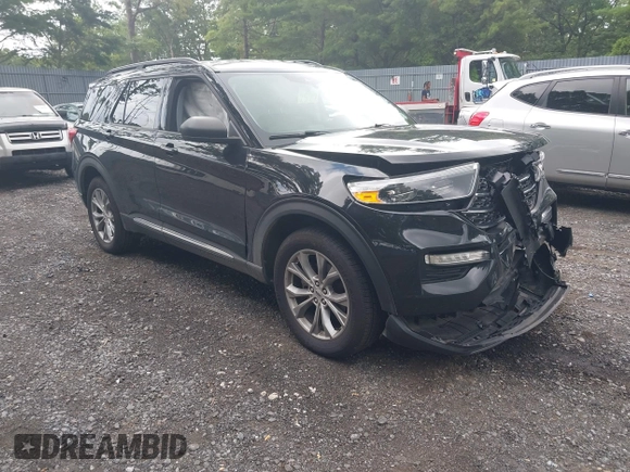 2022 Ford Explorer XLT with VIN 1FMSK8DH9NGA52903, listed as a IAAI auction lot 42704656 with 63,591 mi miles and . Bid and sale history available at DreamBid. Image 1.