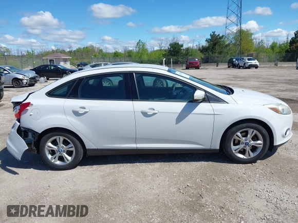 2013 Ford Focus SE with VIN 1FADP3F23DL218239, listed as a IAAI auction lot 42331440 with 156,501 mi miles and . Bid and sale history available at DreamBid. Image 14.