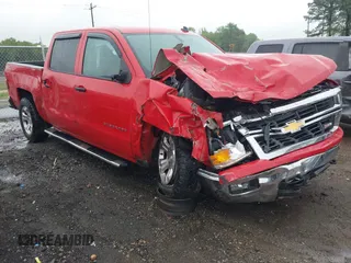 2014 Chevrolet Silverado 1500 LT with VIN 3GCUKREC9EG210621, listed as a IAAI auction lot 42011581 with Not Provided miles and . Bid and sale history available at DreamBid. Image 1.