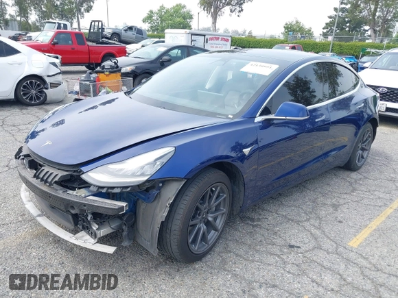 2020 Tesla Model 3 Standard Range Plus z VIN 5YJ3E1EA8LF785010, wystawiony jako IAAI lot #42130951 z przebiegiem 90 072 mil mil oraz . Historia ofert i sprzedaży dostępna na DreamBid. Obrazek 22.