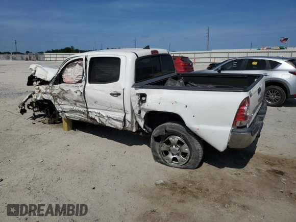 2014 Toyota Tacoma with VIN 5TFLU4EN8EX097721, listed as a Copart auction lot 54512555 with Not Provided miles and Non Repairable. Bid and sale history available at DreamBid. Image 2.
