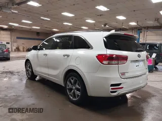 2016 Kia Sorento SX with VIN 5XYPKDA51GG077698, listed as a IAAI auction lot 41501354 with 185,494 mi miles. Bid and sale history available at carsss.com. Image 3.