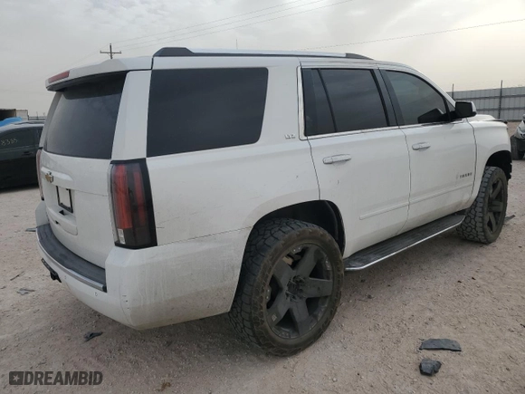 2015 Chevrolet Tahoe LTZ with VIN 1GNSCCKC4FR212548, listed as a Copart auction lot 47474915 with 157,527 mi miles and Salvage Title. Bid and sale history available at carsss.com. Image 3.