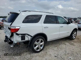 2013 Dodge Durango Citadel z VIN 1C4SDHET0DC617451, wystawiony jako Copart lot #54627075 z przebiegiem 139 414 mil mil oraz Szkoda całkowita • Salvage title. Historia ofert i sprzedaży dostępna na DreamBid. Obrazek 3.