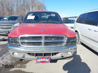 1999 Dodge Dakota SLT with VIN 1B7GG22Y3XS289253, listed as a IAAI auction lot 41283728 with 154,038 mi miles and . Bid and sale history available at carsss.com. Image 6.