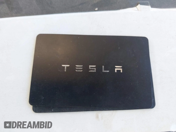 2022 Tesla Model Y Long Range with VIN 7SAYGDEE1NF550202, listed as a IAAI auction lot 42121718 with 28,211 mi miles and . Bid and sale history available at carsss.com. Image 11.