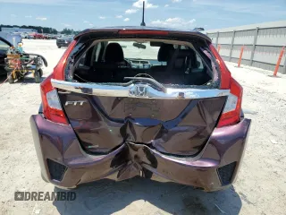 2015 Honda Fit EX z VIN 3HGGK5G82FM745065, wystawiony jako Copart lot #58358525 z przebiegiem 104 769 mil mil oraz Szkoda całkowita • Salvage title. Historia ofert i sprzedaży dostępna na DreamBid. Obrazek 6.