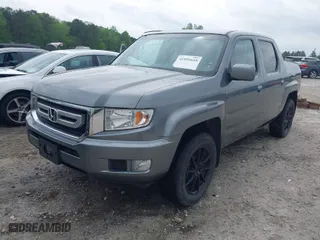 2009 Honda Ridgeline RTS with VIN 2HJYK16459H501516, listed as a IAAI auction lot 41951645 with 174,779 mi miles. Bid and sale history available at carsss.com. Image 2.