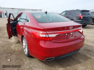 2016 Hyundai Azera Limited with VIN KMHFH4JG9GA555812, listed as a IAAI auction lot 41772140 with 103,027 mi miles. Bid and sale history available at carsss.com. Image 3.