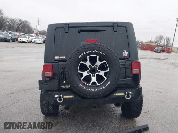 2012 Jeep Wrangler Rubicon with VIN 1C4BJWCG4CL106746, listed as a IAAI auction lot 41162452 with 134,911 mi miles and . Bid and sale history available at DreamBid. Image 17.