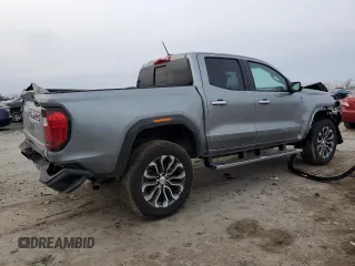 2024 GMC Canyon 4WD Denali with VIN 1GTP6FEKXR1248564, listed as a Copart auction lot 43116895 with 7,044 mi miles and Salvage Title. Bid and sale history available at carsss.com. Image 3.