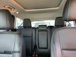 2015 Ford Escape Titanium with VIN 1FMCU0J99FUA16290, listed as a Copart auction lot 52496855 with 107,674 mi miles and Salvage Title. Bid and sale history available at DreamBid. Image 10.